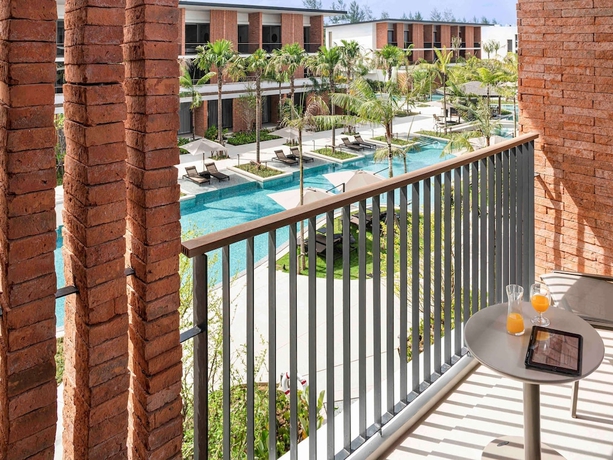 Imagen de la habitación del Hotel Pullman Khao Lak Resort. Foto 12