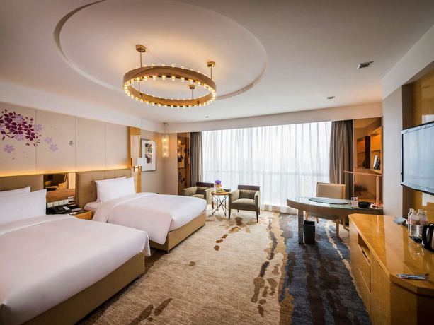 Imagen de la habitación del Hotel Pullman Linyi Lushang. Foto 4