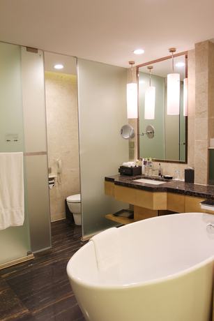 Imagen de la habitación del Hotel Pullman Linyi Lushang. Foto 6