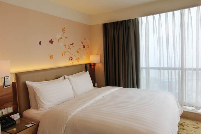 Imagen de la habitación del Hotel Pullman Linyi Lushang. Foto 10