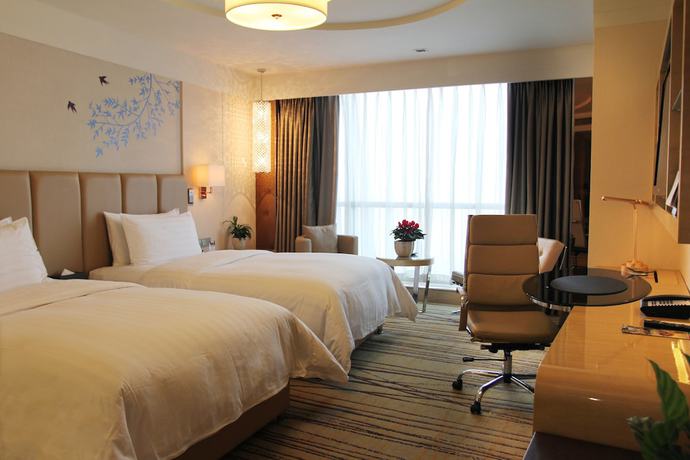 Imagen de la habitación del Hotel Pullman Linyi Lushang. Foto 12