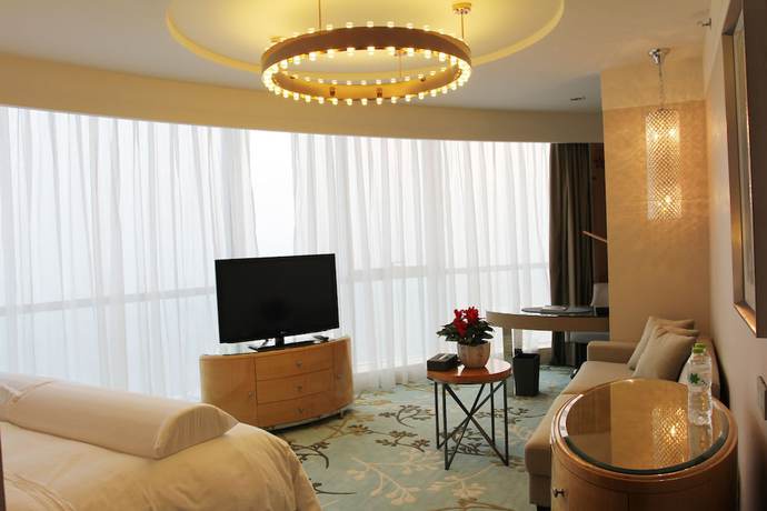 Imagen de la habitación del Hotel Pullman Linyi Lushang. Foto 13