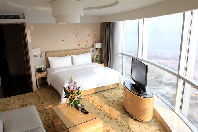 Imagen de la habitación del Hotel Pullman Linyi Lushang. Foto 14