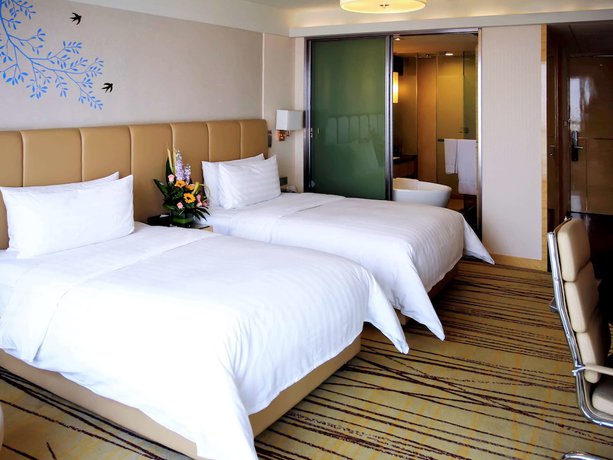 Imagen de la habitación del Hotel Pullman Linyi Lushang. Foto 15