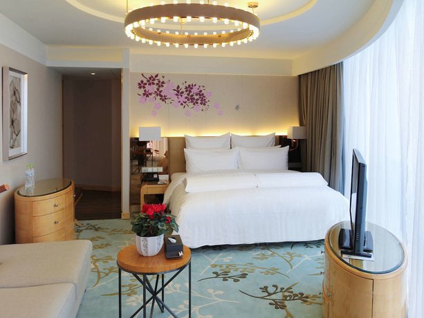 Imagen de la habitación del Hotel Pullman Linyi Lushang. Foto 16