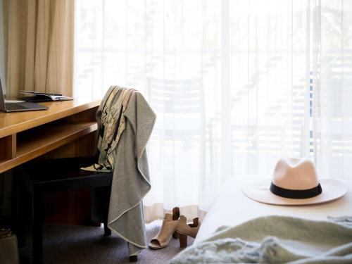 Imagen de la habitación del Hotel Pullman Magenta Shores Resort. Foto 9