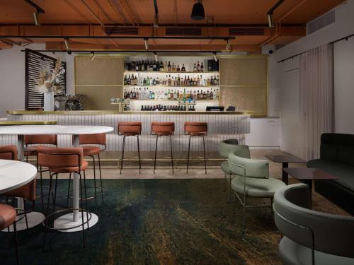 Imagen del bar/restaurante del Hotel Pullman Melbourne City Centre. Foto 9