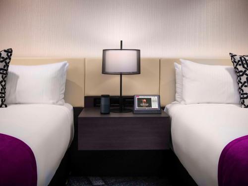 Imagen de la habitación del Hotel Pullman Melbourne City Centre. Foto 19