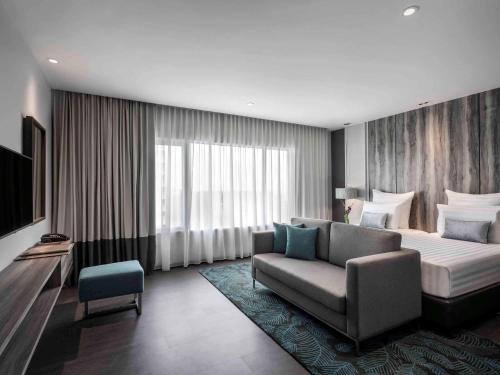 Imagen de la habitación del Hotel Pullman Miri Waterfront. Foto 18