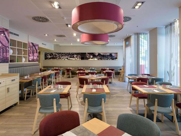 Imagen del bar/restaurante del Hotel Pullman Munich. Foto 3