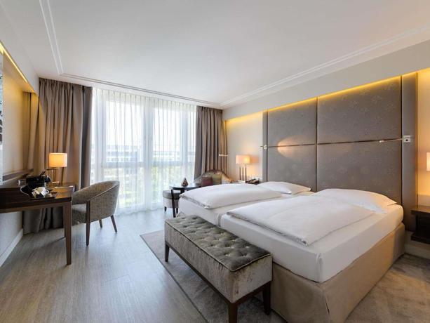 Imagen de la habitación del Hotel Pullman Munich. Foto 7