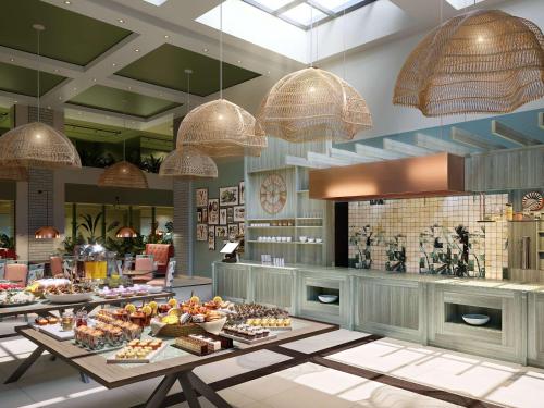 Imagen del bar/restaurante del Hotel Pullman Nairobi Upper Hill. Foto 3