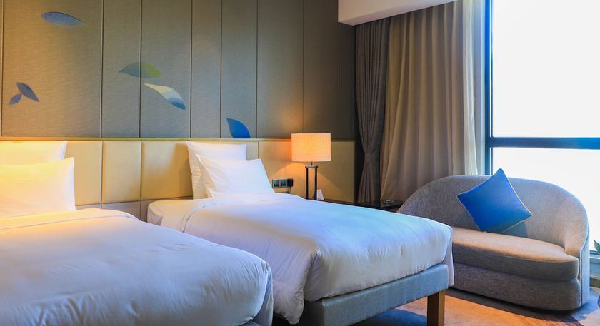 Imagen de la habitación del Hotel Pullman Nanchang Sunac. Foto 11