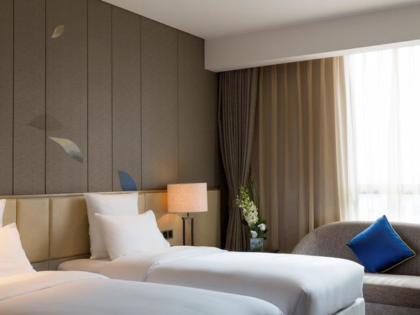 Imagen de la habitación del Hotel Pullman Nanchang Sunac. Foto 14
