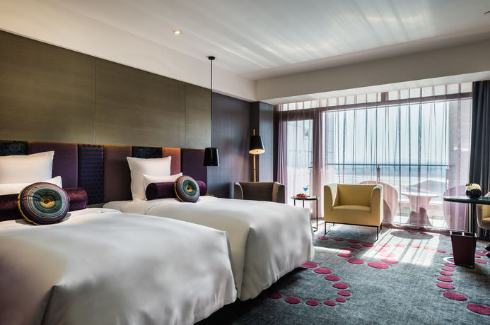 Imagen de la habitación del Hotel Pullman Nanjing Lukou Airport. Foto 8