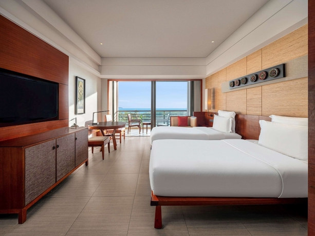 Imagen de la habitación del Hotel Pullman Oceanview Sanya Bay Resort and Spa. Foto 2
