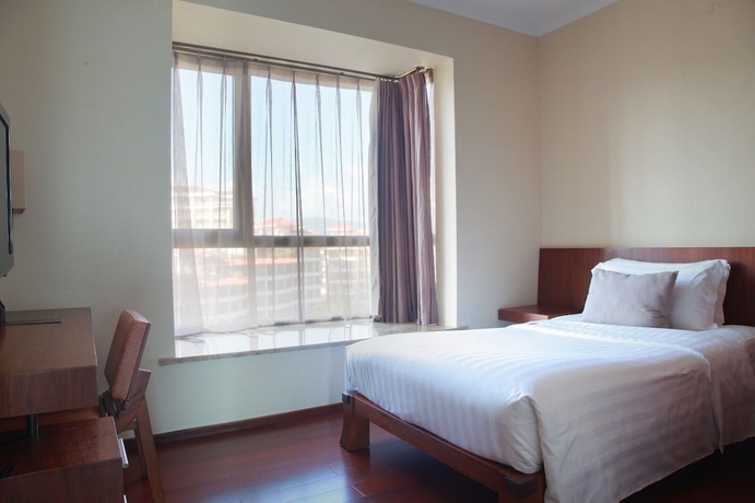 Imagen de la habitación del Hotel Pullman Oceanview Sanya Bay Resort and Spa. Foto 19