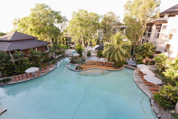 Imagen de la piscina del Hotel Pullman Palm Cove Sea Temple Resort and Spa. Foto 13