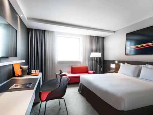 Imagen de la habitación del Hotel Pullman Paris La Défense. Foto 4