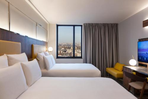 Imagen de la habitación del Hotel Pullman Paris Montparnasse. Foto 8