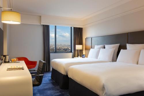 Imagen de la habitación del Hotel Pullman Paris Montparnasse. Foto 14