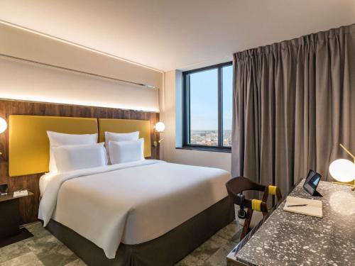 Imagen de la habitación del Hotel Pullman Paris Montparnasse. Foto 18