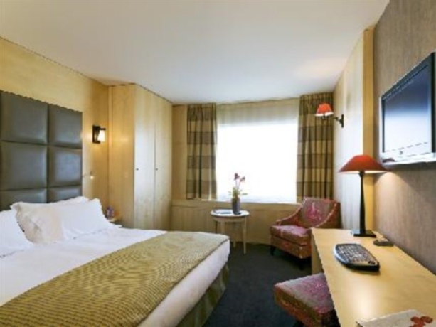 Imagen de la habitación del Hotel Pullman Paris Rive Gauche. Foto 6