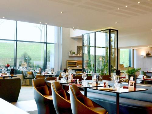 Imagen del bar/restaurante del Hotel Pullman Paris Roissy Cdg Airport. Foto 10