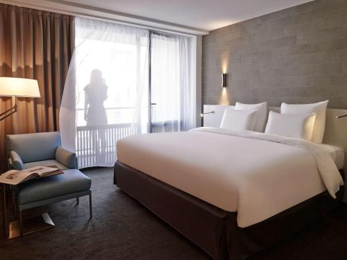 Imagen de la habitación del Hotel Pullman Paris Tour Eiffel. Foto 14