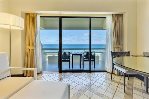 Imagen de la habitación del Hotel Pullman Phuket Karon Beach Resort. Foto 4