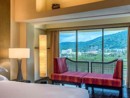 Imagen de la habitación del Hotel Pullman Phuket Karon Beach Resort. Foto 15