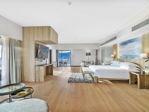 Imagen de la habitación del Hotel Pullman Phuket Karon Beach Resort. Foto 20