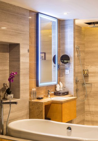Imagen de la habitación del Hotel Pullman Qingdao Ziyue. Foto 3