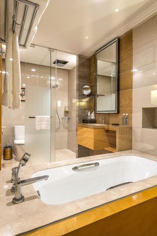 Imagen de la habitación del Hotel Pullman Qingdao Ziyue. Foto 8