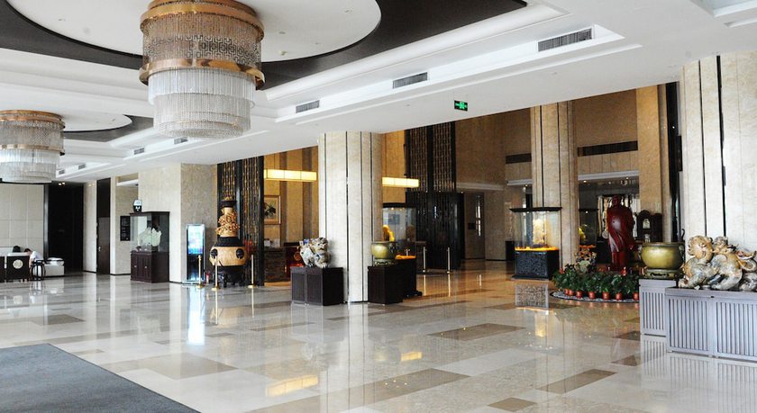 Imagen de los interiores del Hotel Pullman Qingdao Ziyue. Foto 20