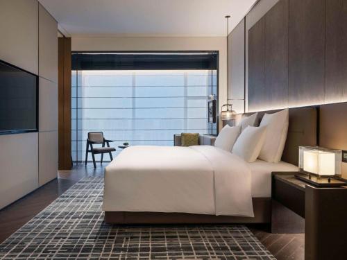 Imagen de la habitación del Hotel Pullman Quanzhou Shuitou. Foto 12