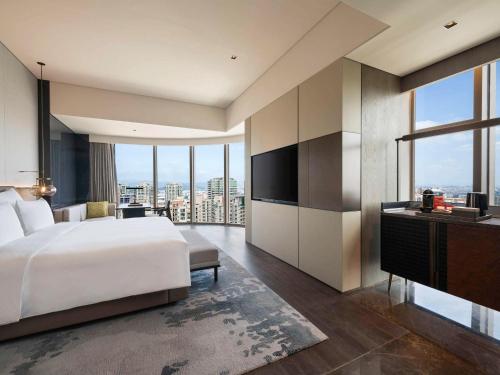 Imagen de la habitación del Hotel Pullman Quanzhou Shuitou. Foto 15
