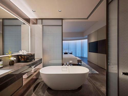 Imagen de la habitación del Hotel Pullman Quanzhou Shuitou. Foto 17