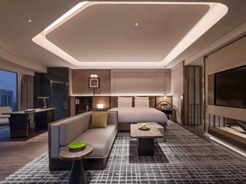 Imagen de la habitación del Hotel Pullman Quanzhou Shuitou. Foto 18