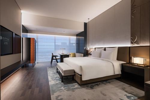Imagen de la habitación del Hotel Pullman Quanzhou Shuitou. Foto 19