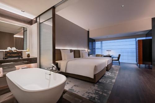 Imagen de la habitación del Hotel Pullman Quanzhou Shuitou. Foto 20