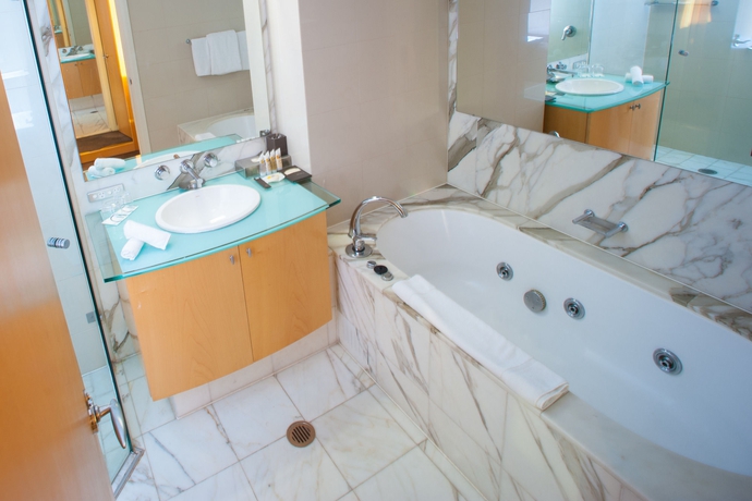 Imagen de la habitación del Hotel Pullman Quay Grand Sydney Harbour. Foto 5