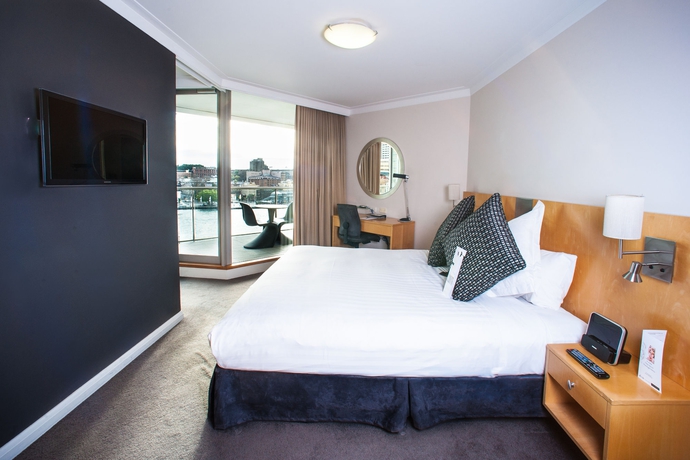 Imagen de la habitación del Hotel Pullman Quay Grand Sydney Harbour. Foto 6
