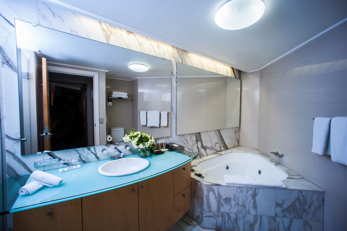 Imagen de la habitación del Hotel Pullman Quay Grand Sydney Harbour. Foto 10