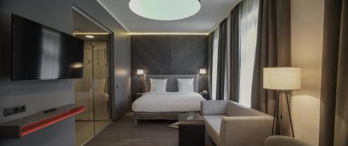 Imagen de la habitación del Hotel Pullman Riga Old Town. Foto 16