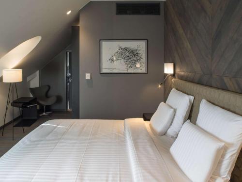 Imagen de la habitación del Hotel Pullman Riga Old Town. Foto 17