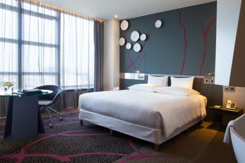 Imagen de la habitación del Hotel Pullman Saigon Centre. Foto 6