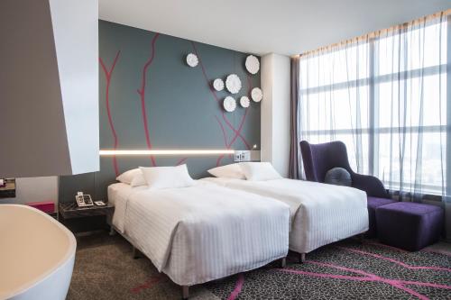 Imagen de la habitación del Hotel Pullman Saigon Centre. Foto 7