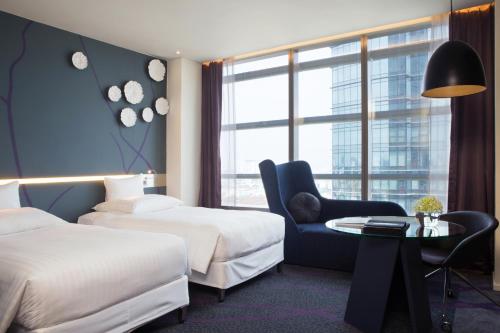 Imagen de la habitación del Hotel Pullman Saigon Centre. Foto 8