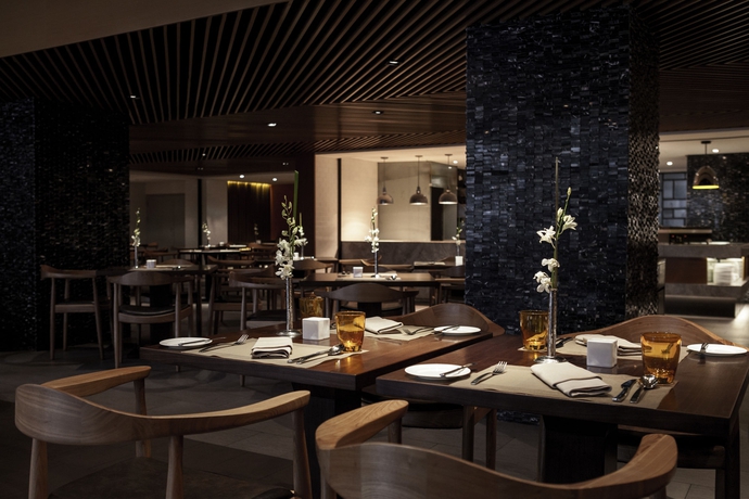 Imagen del bar/restaurante del Hotel Pullman Shanghai Central. Foto 2